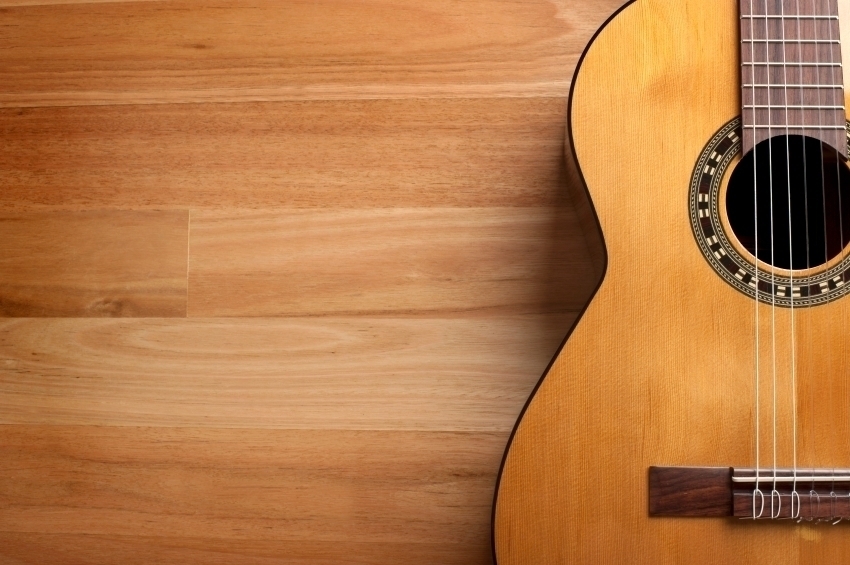Acoustic guitar with wood background - Matt Norman